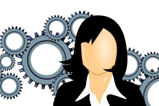 Business professional analysing global phone number options including Toll-Free and UIFN