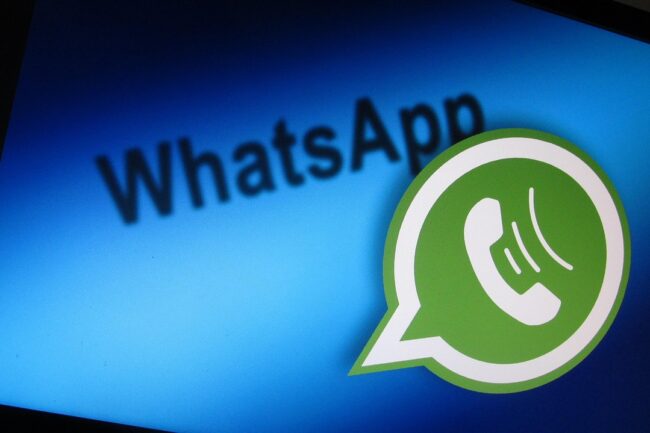 using WhatsApp Business to respond to international customer queries on a mobile phone.